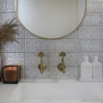 bathroom-mirror Image of a mirror on the wall in a bathroom setting